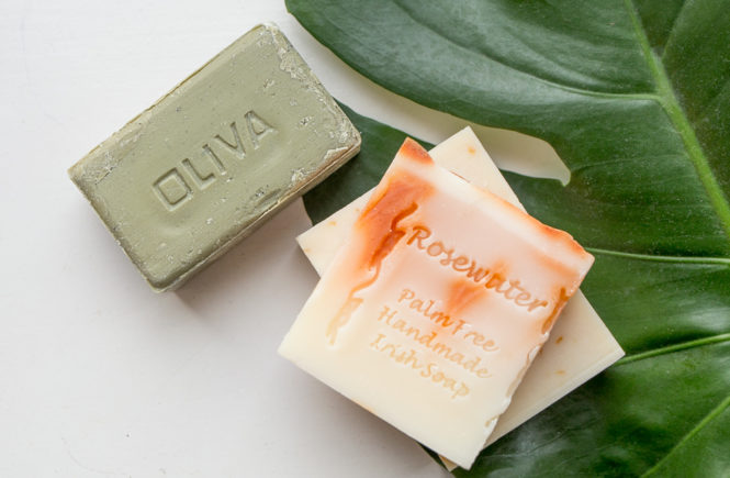 Soap bars and leaf on a white background